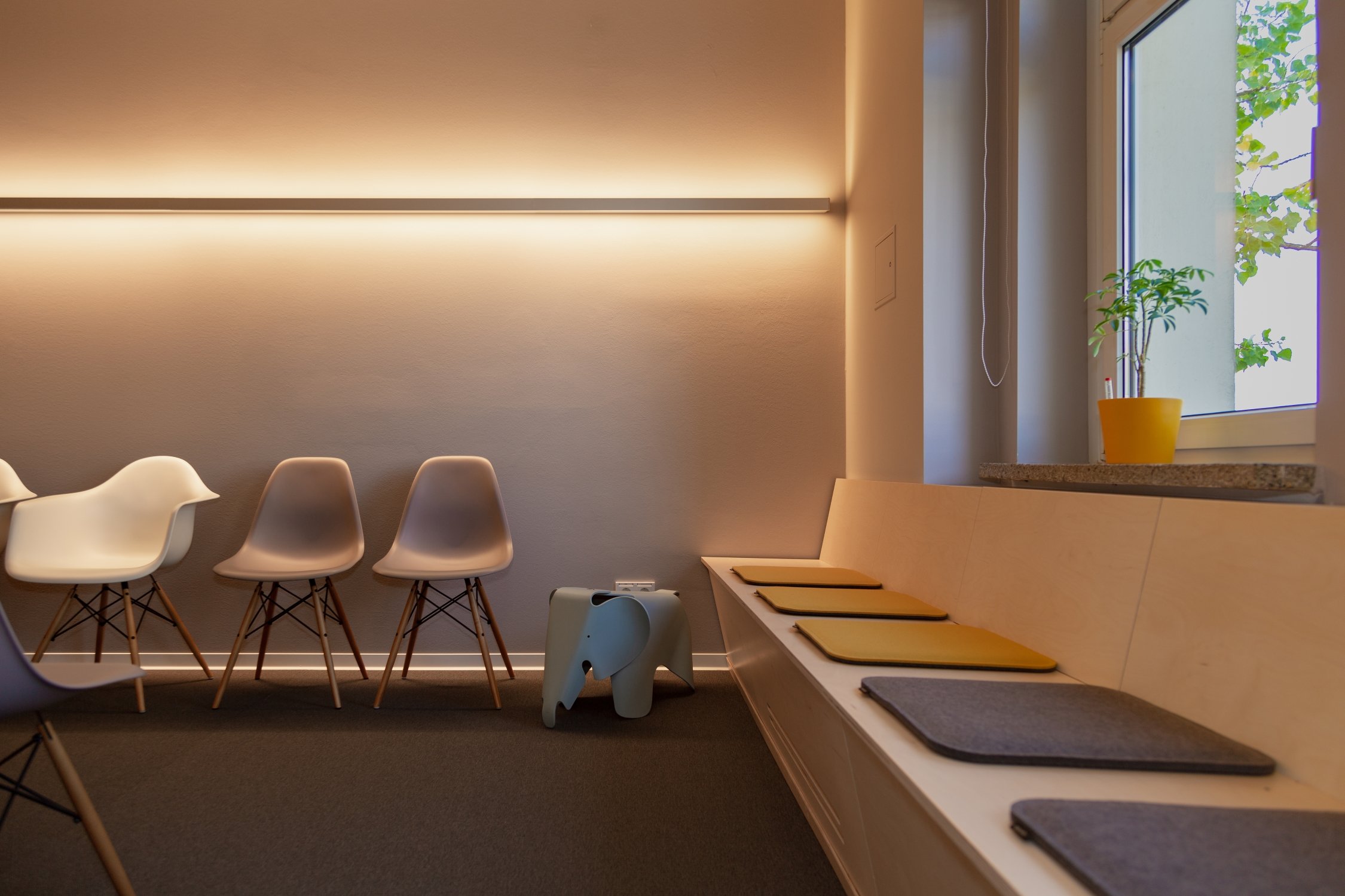 Waiting room with harmonious light and colour concept